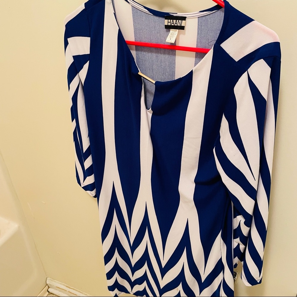 A brand-new white and blue dress perfect for going out or the summer Never worn